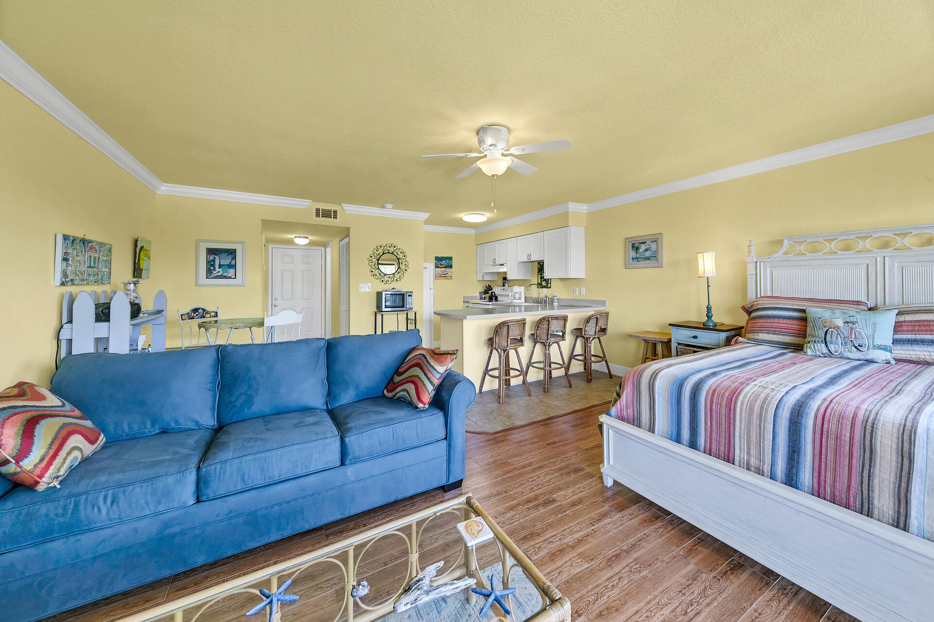 145 Beachfront Trail, Unit 202 Santa Rosa Beach, FL 32459 - Photo 17 of 26 a spacious bedroom with a bed couch and a window