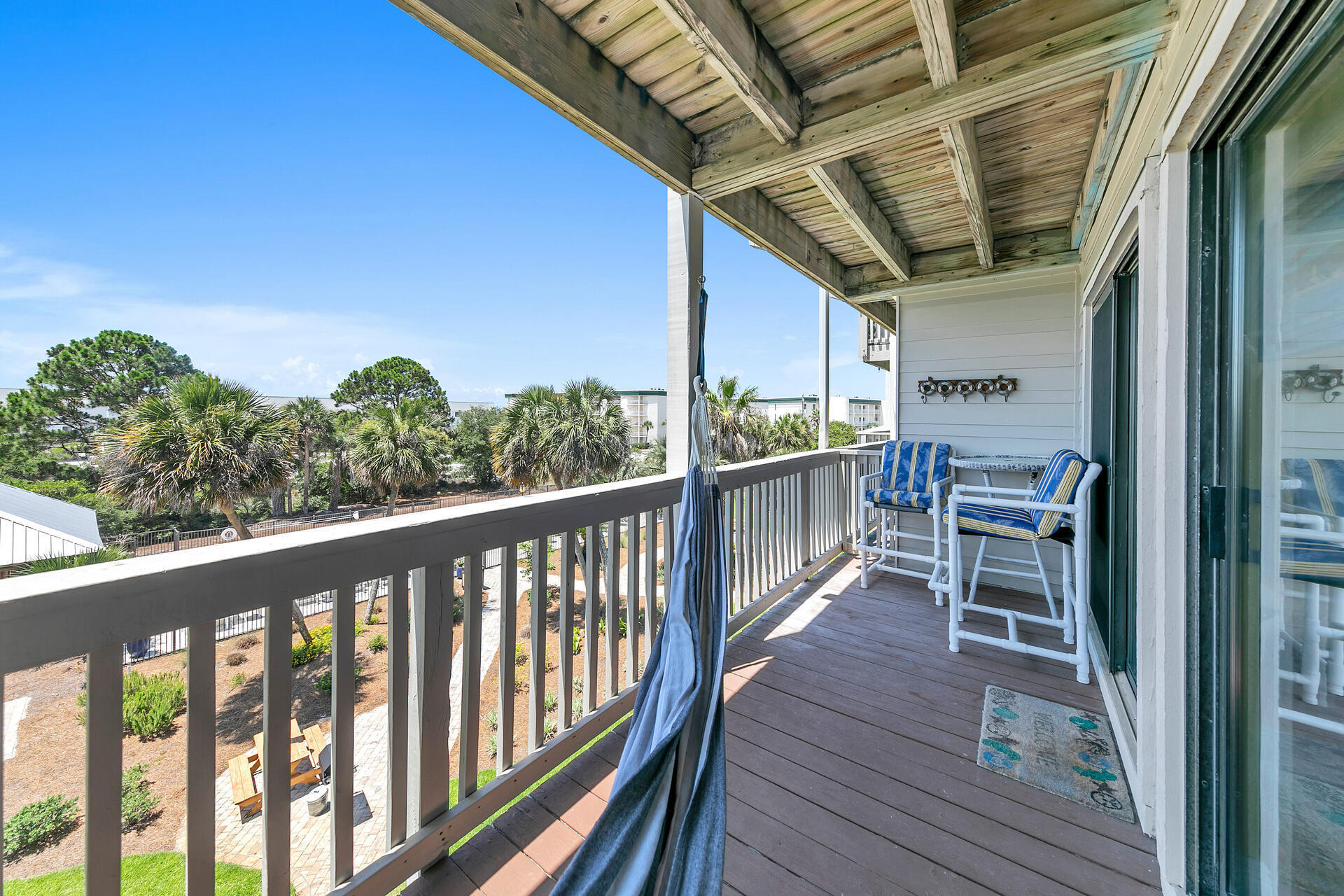 145 Beachfront Trail, Unit 202 Santa Rosa Beach, FL 32459 - Photo 18 of 26 a view of a balcony with chairs