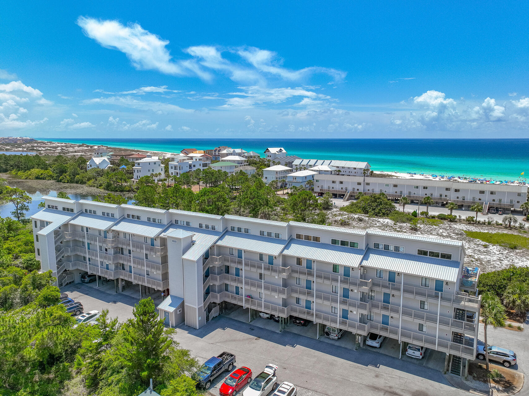 145 Beachfront Trail, Unit 202 Santa Rosa Beach, FL 32459 - Photo 2 of 26 a view of a balcony with an outdoor seating