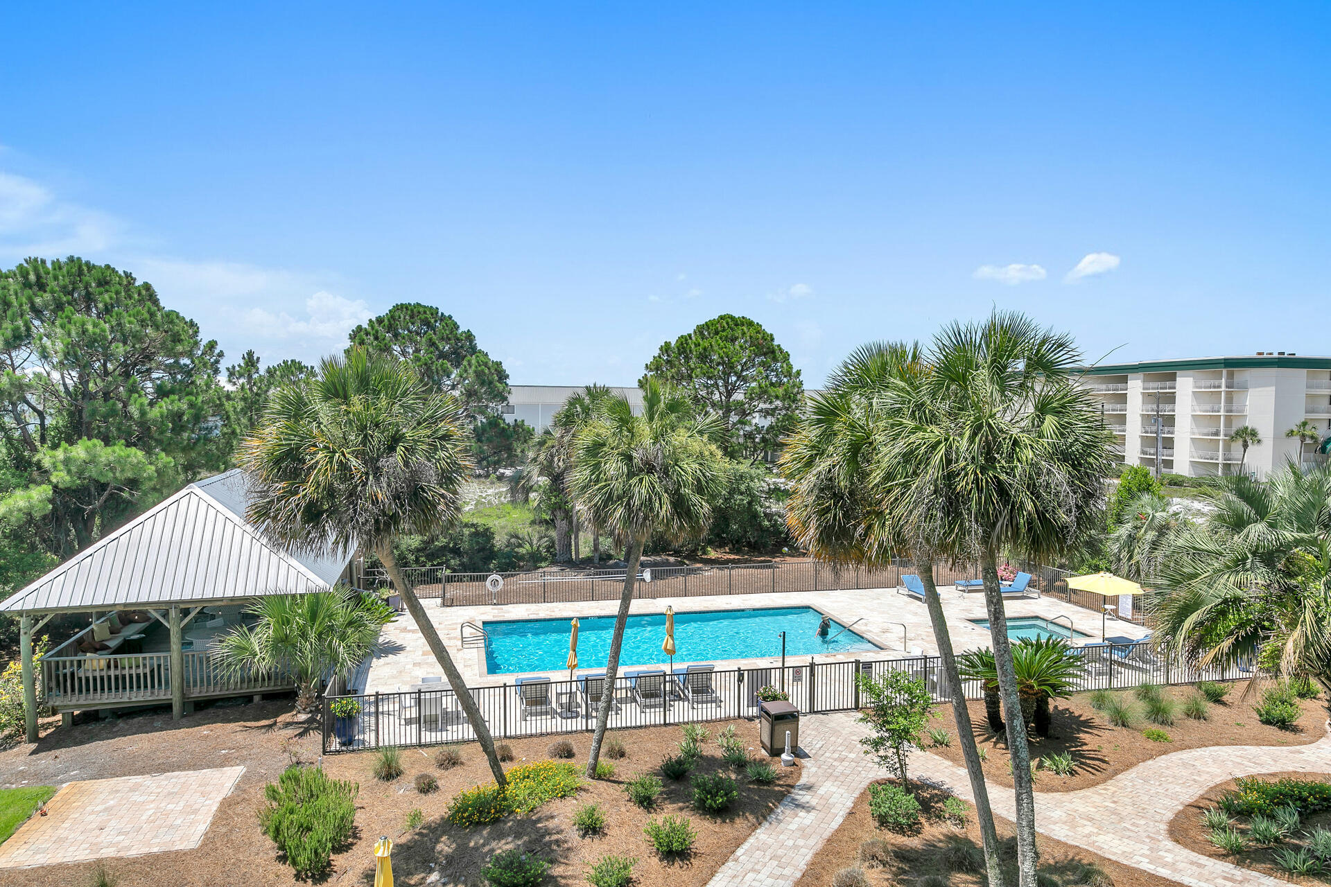 145 Beachfront Trail, Unit 202 Santa Rosa Beach, FL 32459 - Photo 21 of 26 a view of a swimming pool with a patio