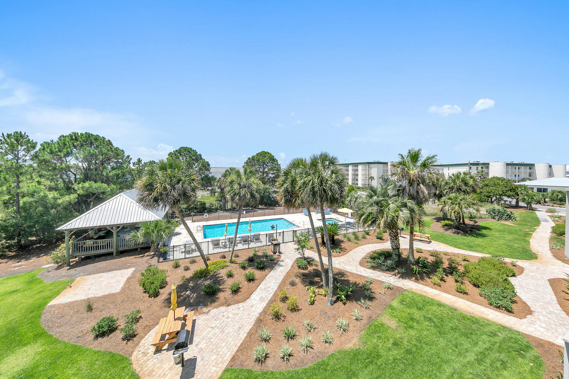 145 Beachfront Trail, Unit 202 Santa Rosa Beach, FL 32459 - Photo 22 of 26 a view of a swimming pool with a patio
