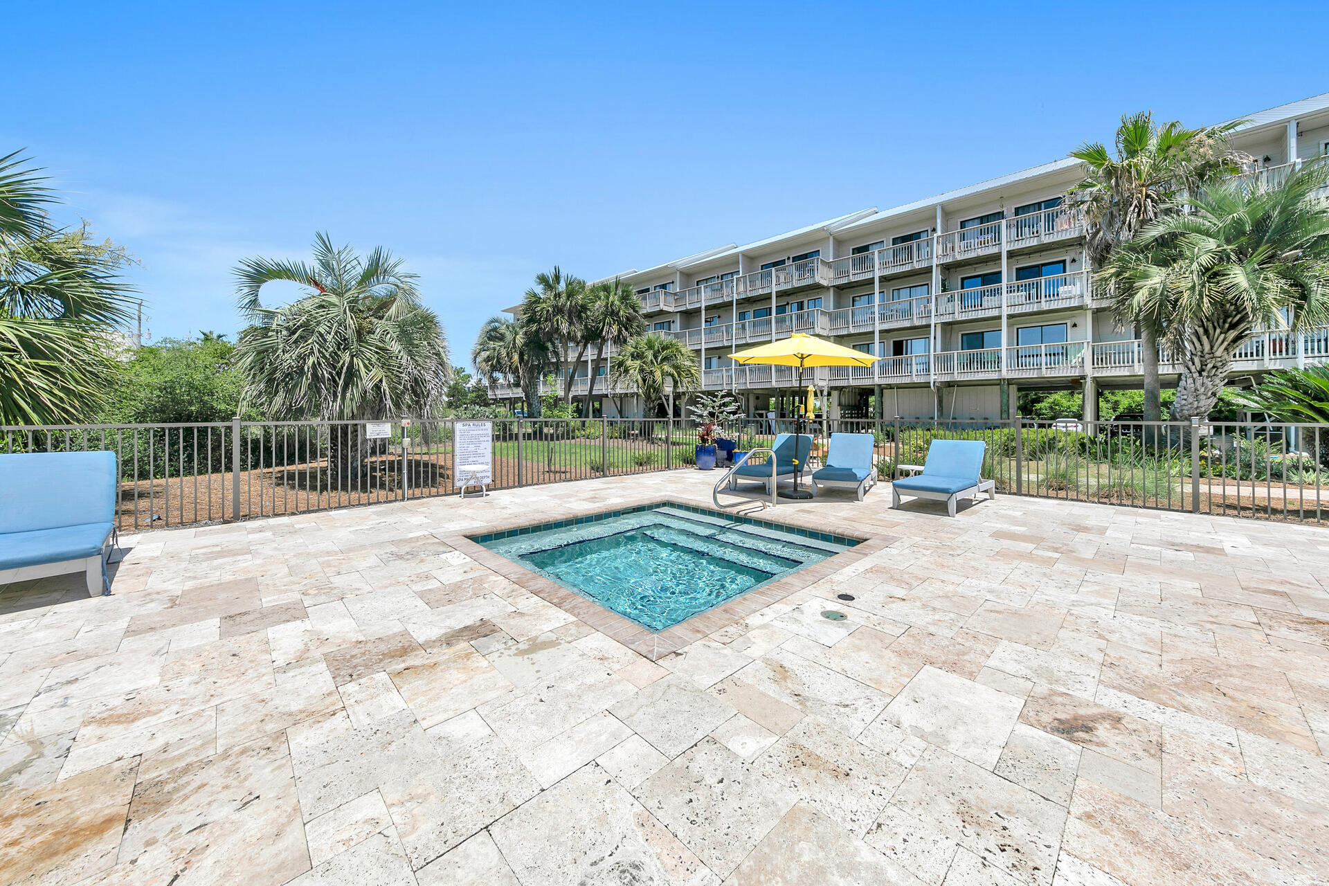 145 Beachfront Trail, Unit 202 Santa Rosa Beach, FL 32459 - Photo 24 of 26 a view of a building with of garden