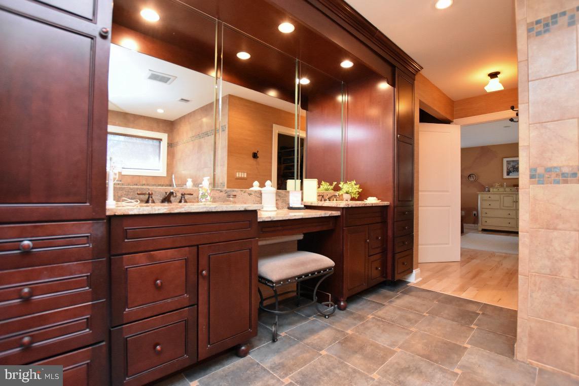 1023 Prospect Ridge Boulevard Haddon Heights, NJ 08035 - Photo 34 of 44 a bathroom with a sink and a mirror