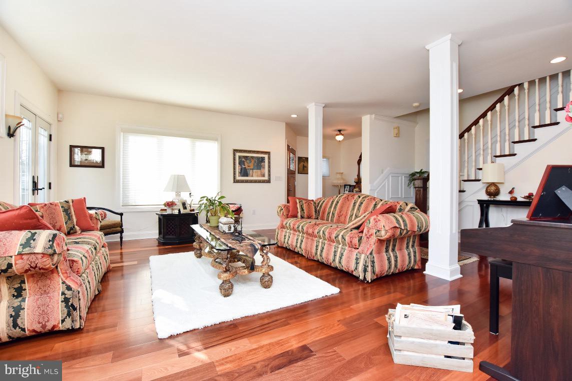 1023 Prospect Ridge Boulevard Haddon Heights, NJ 08035 - Photo 6 of 44 a living room with furniture and wooden floor