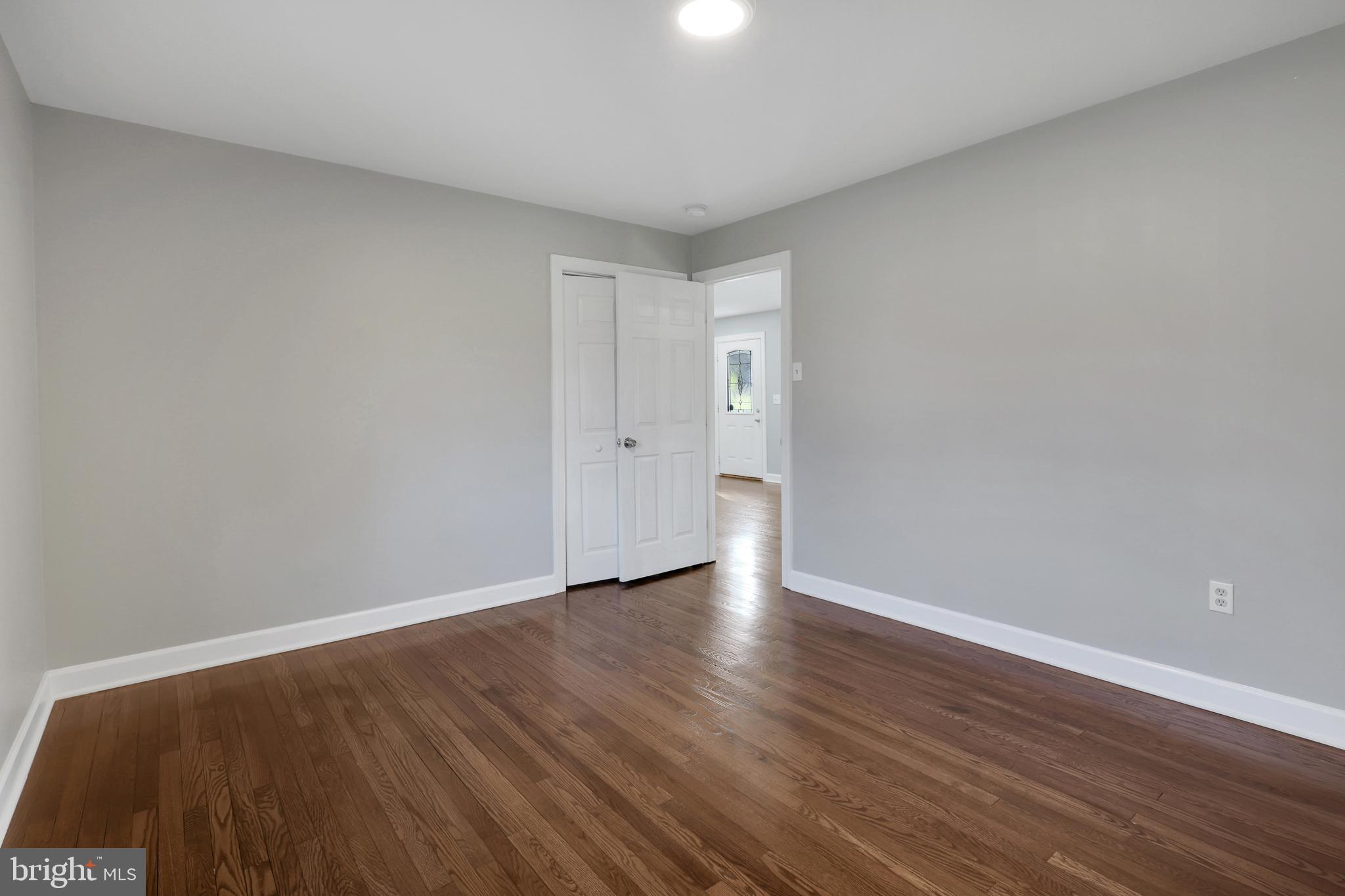 258 Martin Payne Road Kearneysville, WV 25430 - Photo 11 of 35 a view of an empty room and wooden floor
