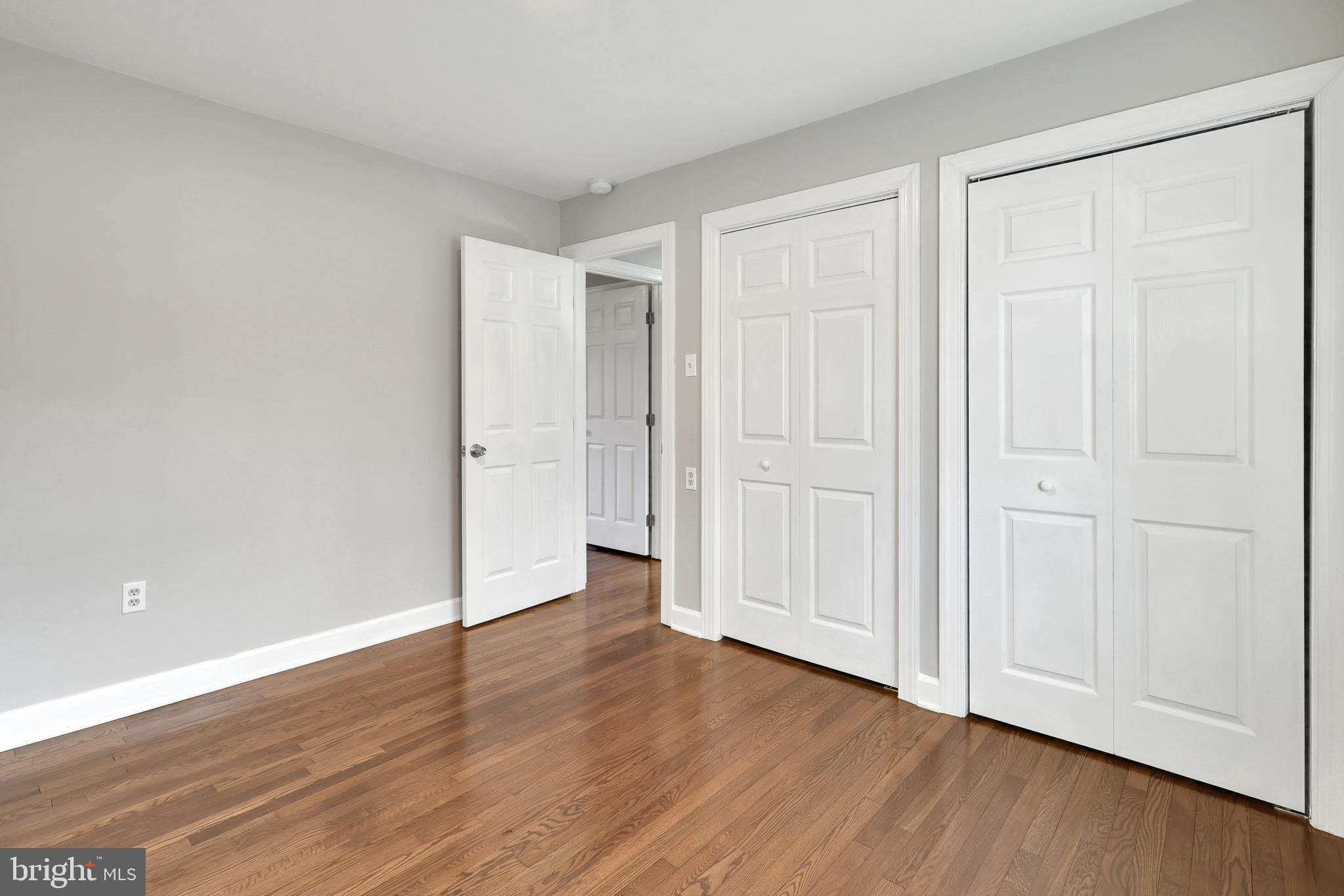 258 Martin Payne Road Kearneysville, WV 25430 - Photo 13 of 35 a view of an empty room with wooden floor