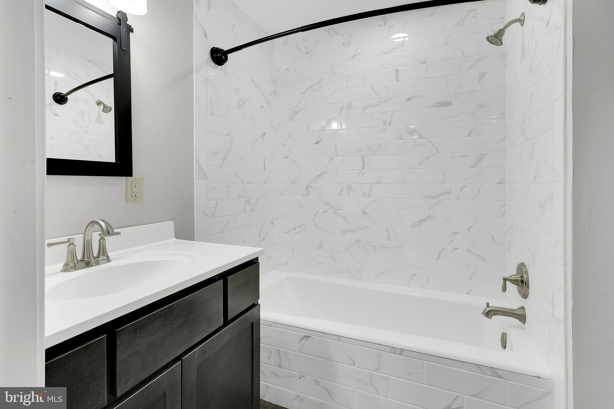 258 Martin Payne Road Kearneysville, WV 25430 - Photo 14 of 35 a bathroom with a sink and a mirror