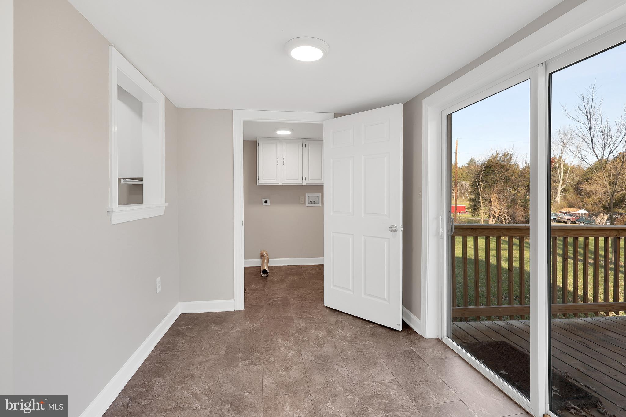 258 Martin Payne Road Kearneysville, WV 25430 - Photo 21 of 35 wooden floor in an empty room with a window