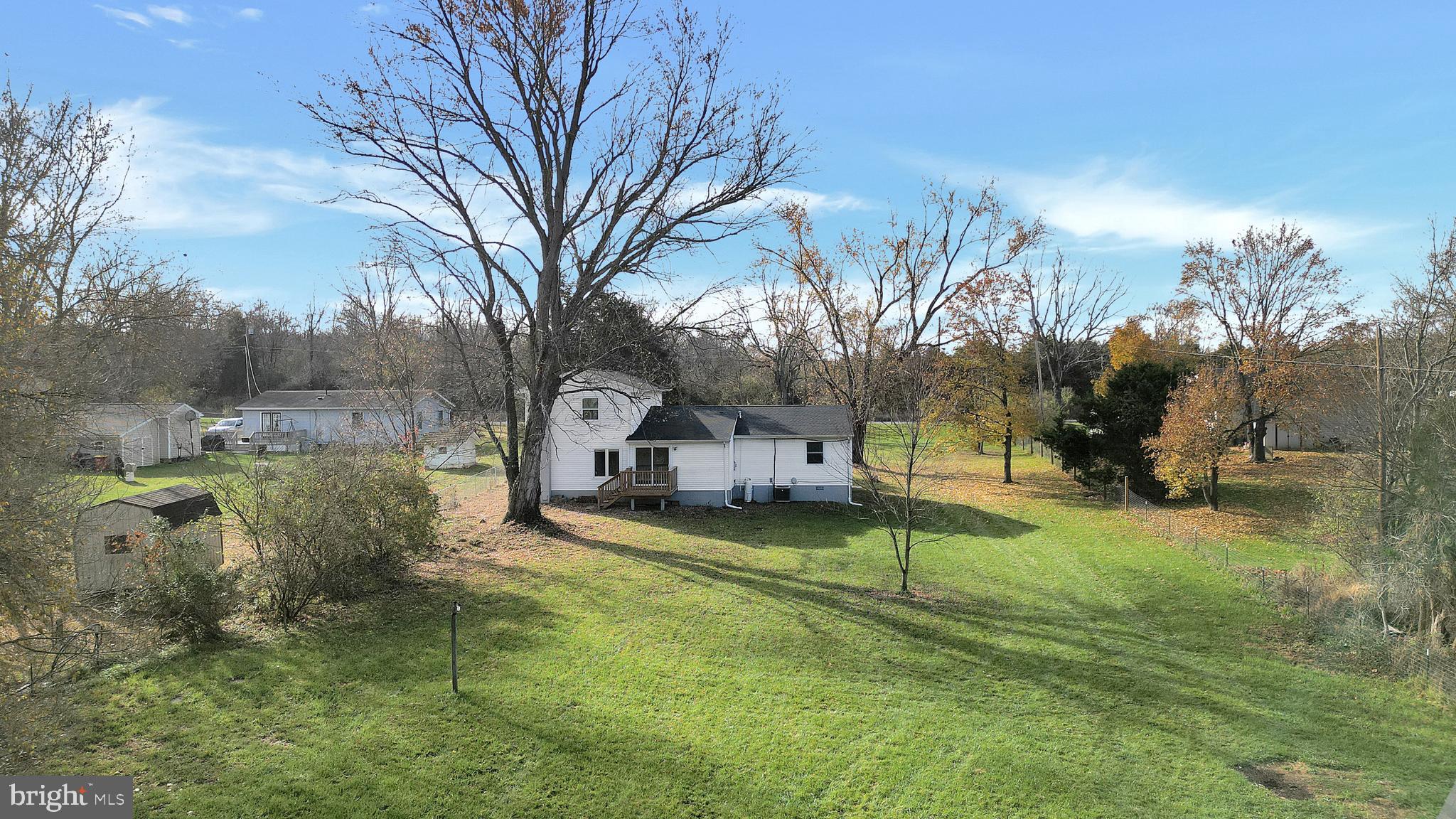 258 Martin Payne Road Kearneysville, WV 25430 - Photo 32 of 35 a view of a town with barn house in the background