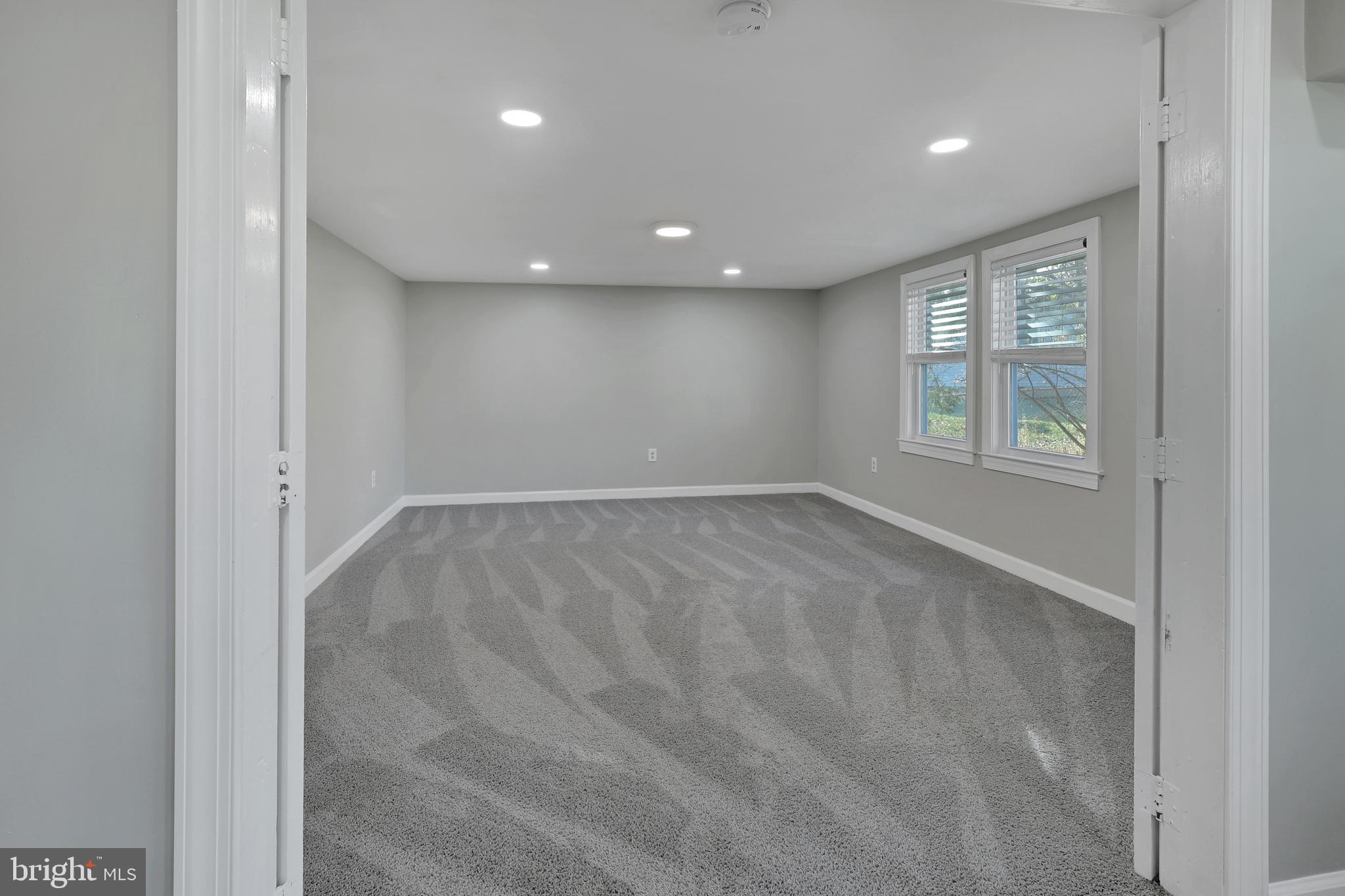 258 Martin Payne Road Kearneysville, WV 25430 - Photo 7 of 35 an empty room with windows