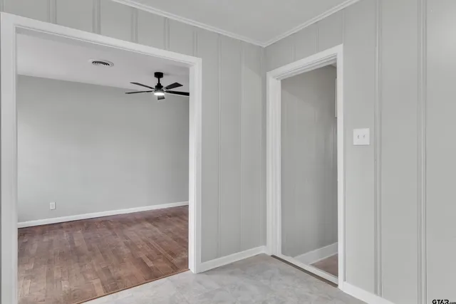 a view of a hallway with closet