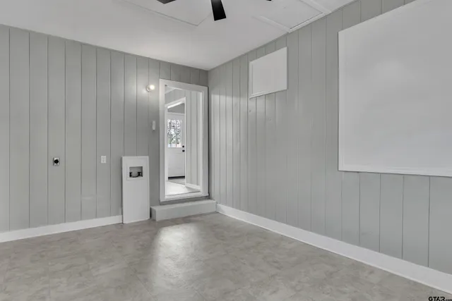 a view of an empty room and window