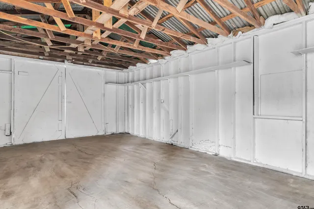 a view of a room with racks on the wall