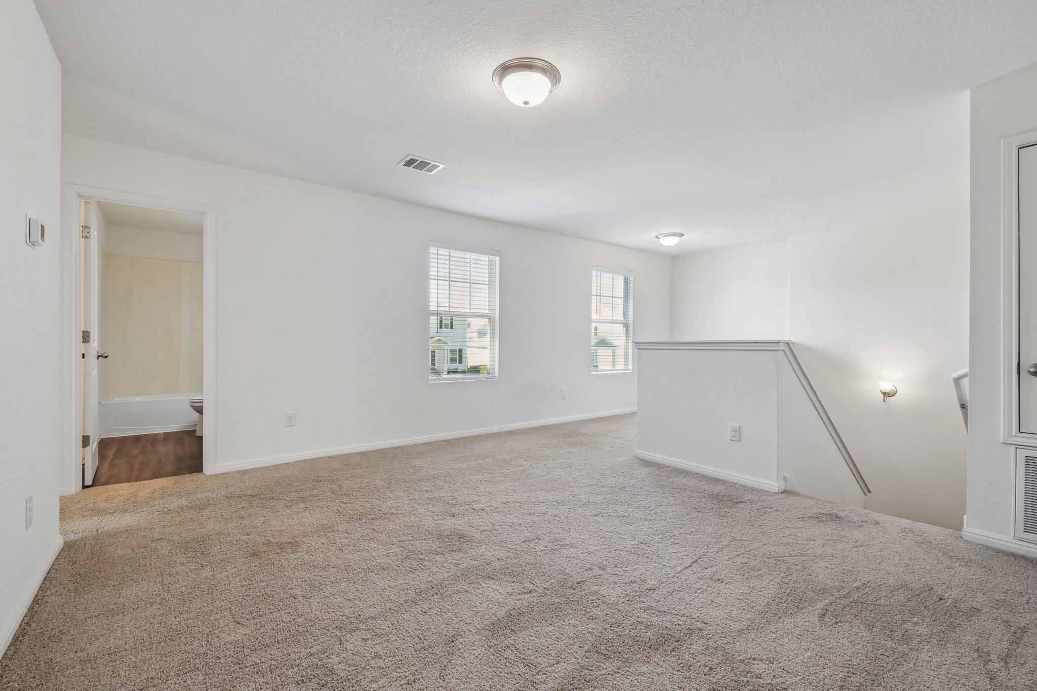 14105 Jeannette Rankin Rd Manor Manor, TX 78653 - Photo 11 of 29 Upstairs second living space with an office nook.