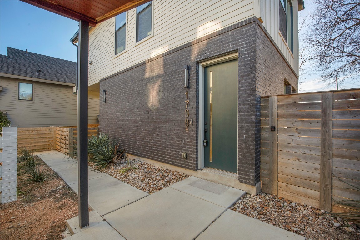 1708 Perez Street, Unit B Austin, TX 78721 - Photo 17 of 19 a view of a house with a glass door