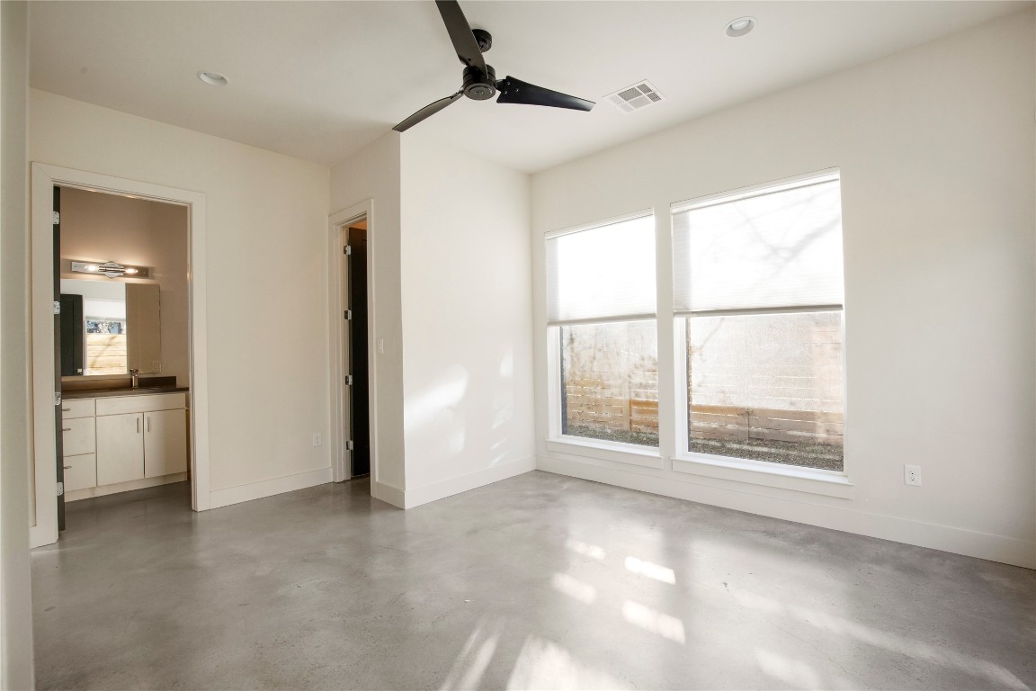 1708 Perez Street, Unit B Austin, TX 78721 - Photo 6 of 19 a view of an empty room with a window