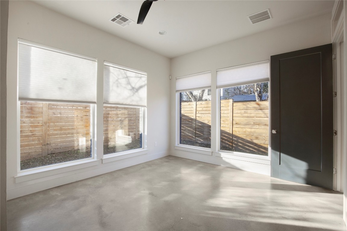 1708 Perez Street, Unit B Austin, TX 78721 - Photo 7 of 19 a view of an empty room with glass door