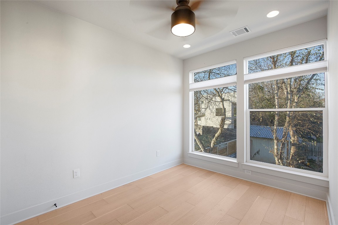 1708 Perez Street, Unit B Austin, TX 78721 - Photo 8 of 19 a view of an empty room with a window