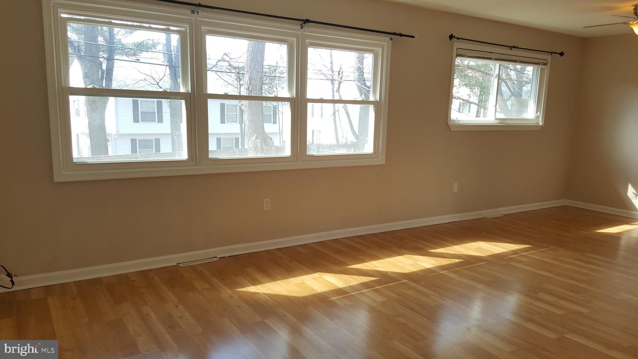 202 Highfalcon Road Reisterstown, MD 21136 - Photo 14 of 38 Living Room next to Dinning Room