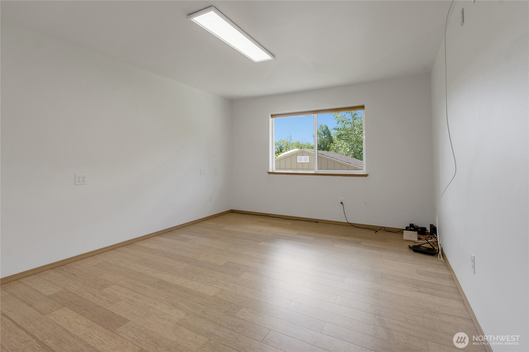 1450 Southeast Spruce Road Port Orchard, WA 98367 - Photo 21 of 39 an empty room with a window
