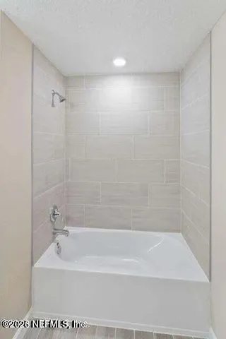 a bathroom with a bathtub