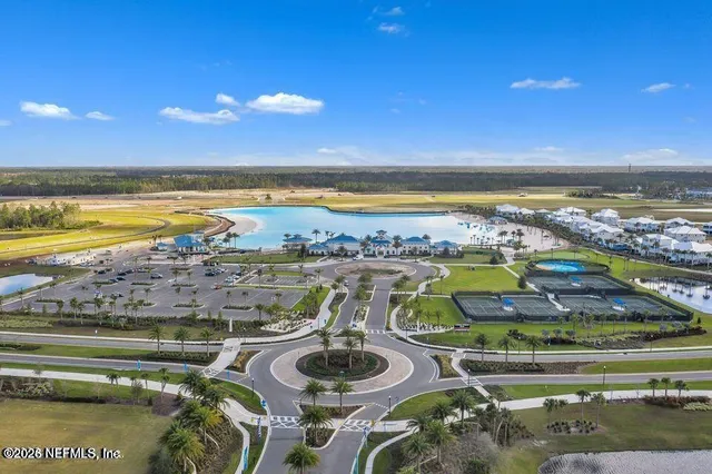 a view of a swimming pool with an ocean view