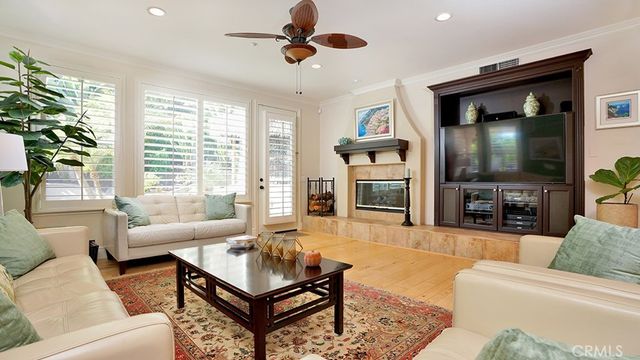 a bathroom with a sink toilet and a mirror