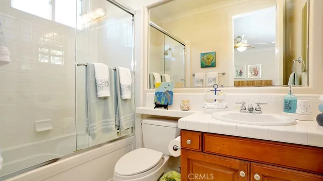 a view of a backyard with plants and a patio