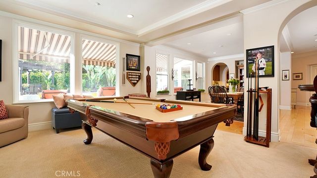 a living room with furniture fireplace and a flat screen tv