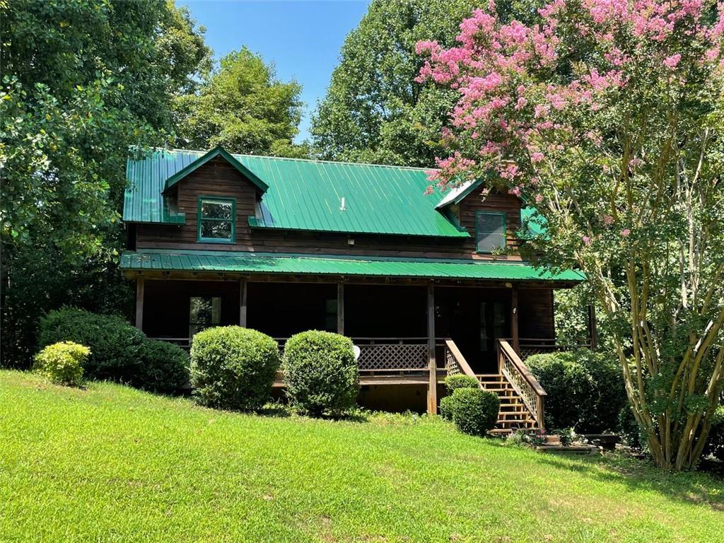 867 Merck Road Cleveland, GA 30528 - Photo 1 of 1 Street view of cabin