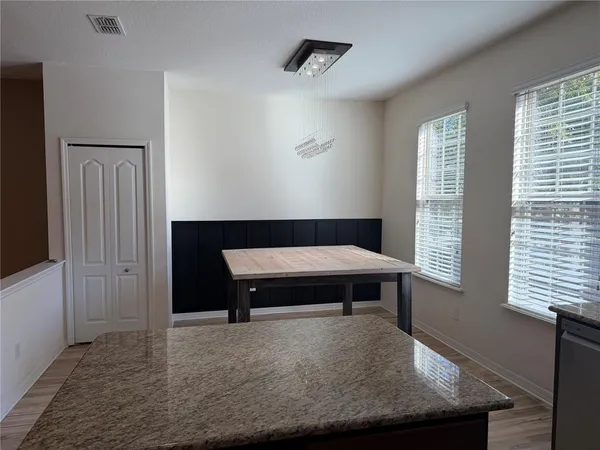 a living room with a couch and a table