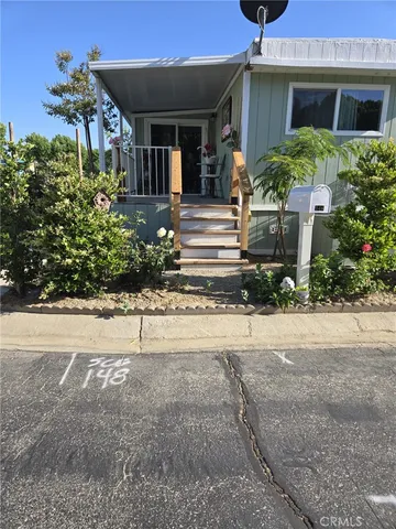 a front view of a house having yard
