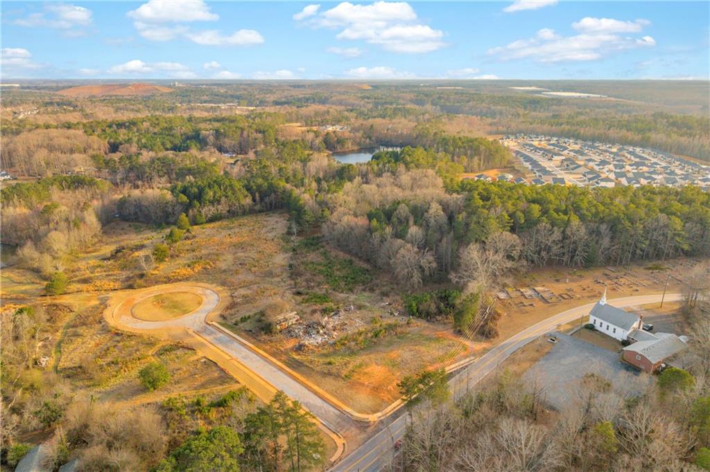7580 Rivertown Road Fairburn, GA 30213 - Photo 11 of 17 a view of a lake