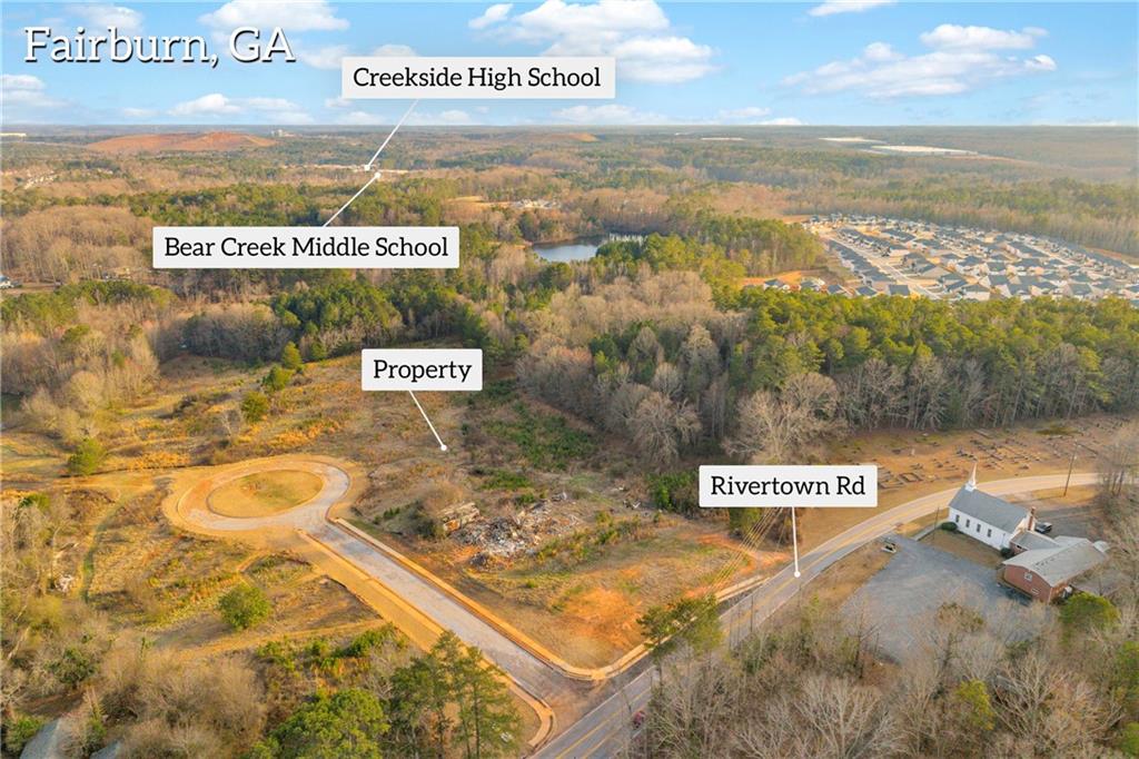 7580 Rivertown Road Fairburn, GA 30213 - Photo 12 of 17 a view of a sign board