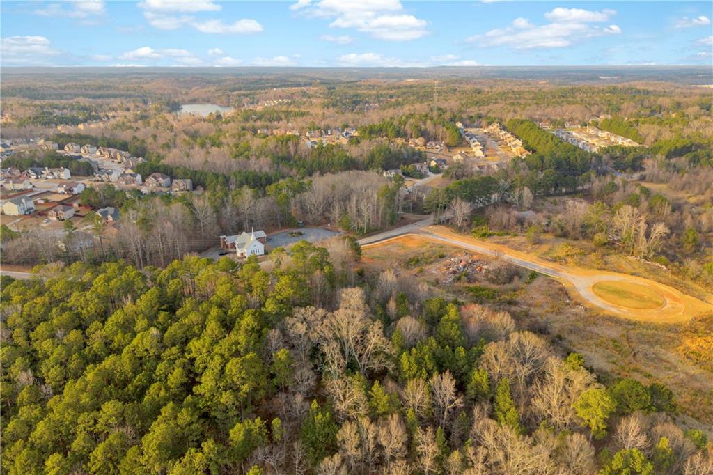 7580 Rivertown Road Fairburn, GA 30213 - Photo 7 of 17 a view of lake and mountain