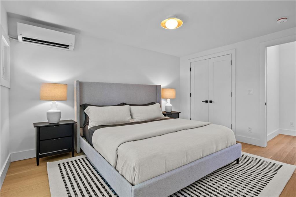 401 18th Street Brooklyn, NY 11215 - Photo 12 of 17 a bedroom with a bed and lamps