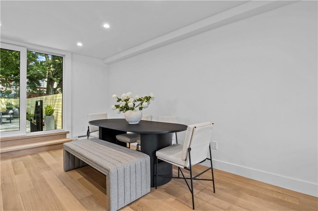 401 18th Street Brooklyn, NY 11215 - Photo 9 of 17 a dining room with furniture and window