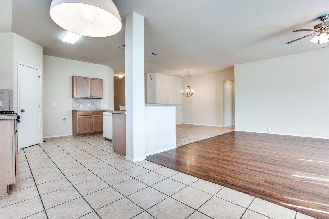Undisclosed Address Round Rock, TX 78665 - Photo 14 of 25 a view of a kitchen with a sink and an empty room
