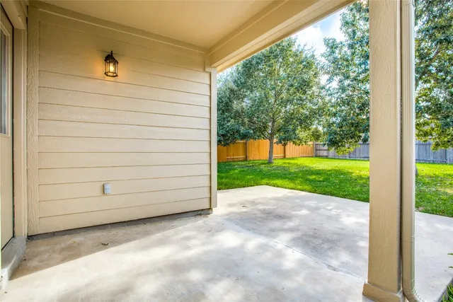 a view of a backyard with garage