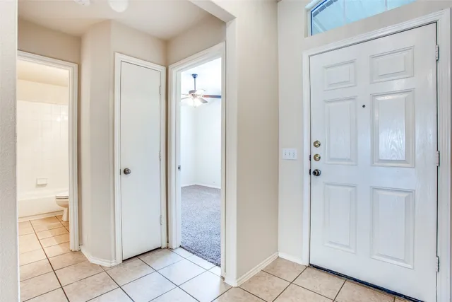 a view of a bathroom from the hallway
