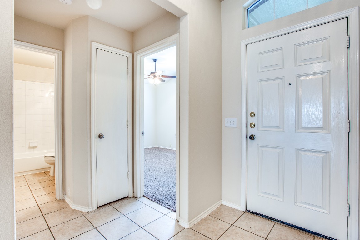 Undisclosed Address Round Rock, TX 78665 - Photo 3 of 25 a view of a bathroom from the hallway
