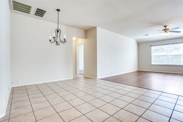 a view of an empty room and window