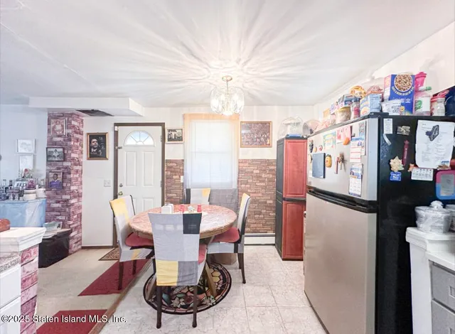 a kitchen with a sink stove and white cabinets