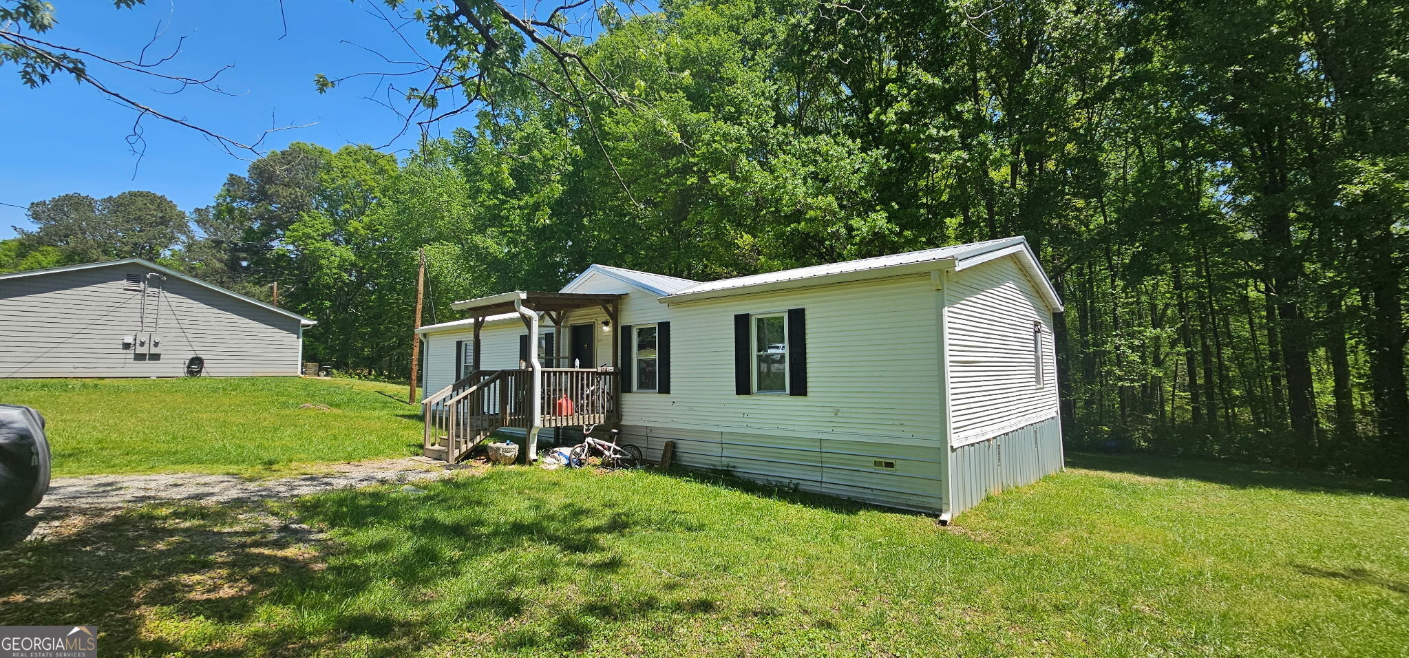 234 Temple Terrace Temple, GA 30179 - Photo 13 of 17 a view of backyard of house with green space