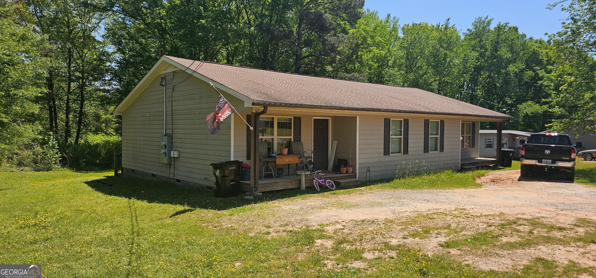 234 Temple Terrace Temple, GA 30179 - Photo 2 of 17 a view of a house with a yard covered in snow