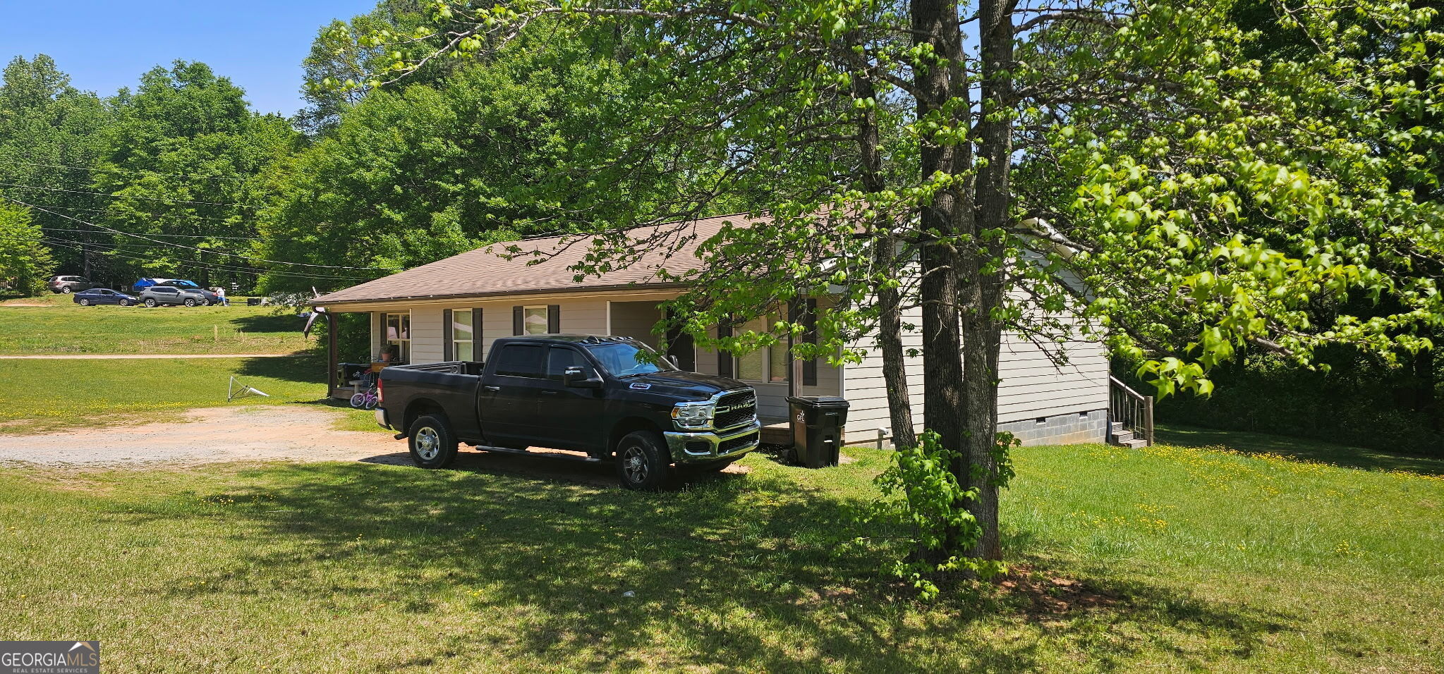 234 Temple Terrace Temple, GA 30179 - Photo 3 of 17 a view of house with garden space and trees