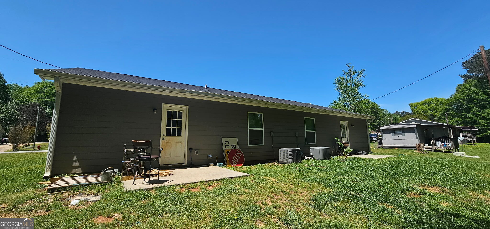 234 Temple Terrace Temple, GA 30179 - Photo 5 of 17 front view of a house with a patio