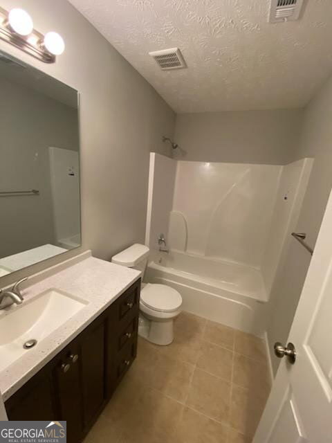 234 Temple Terrace Temple, GA 30179 - Photo 9 of 17 a bathroom with a double vanity sink toilet and shower