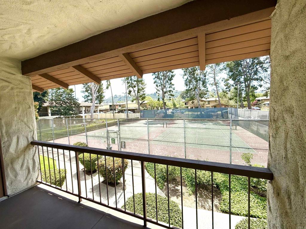 a view of outdoor space with deck and table