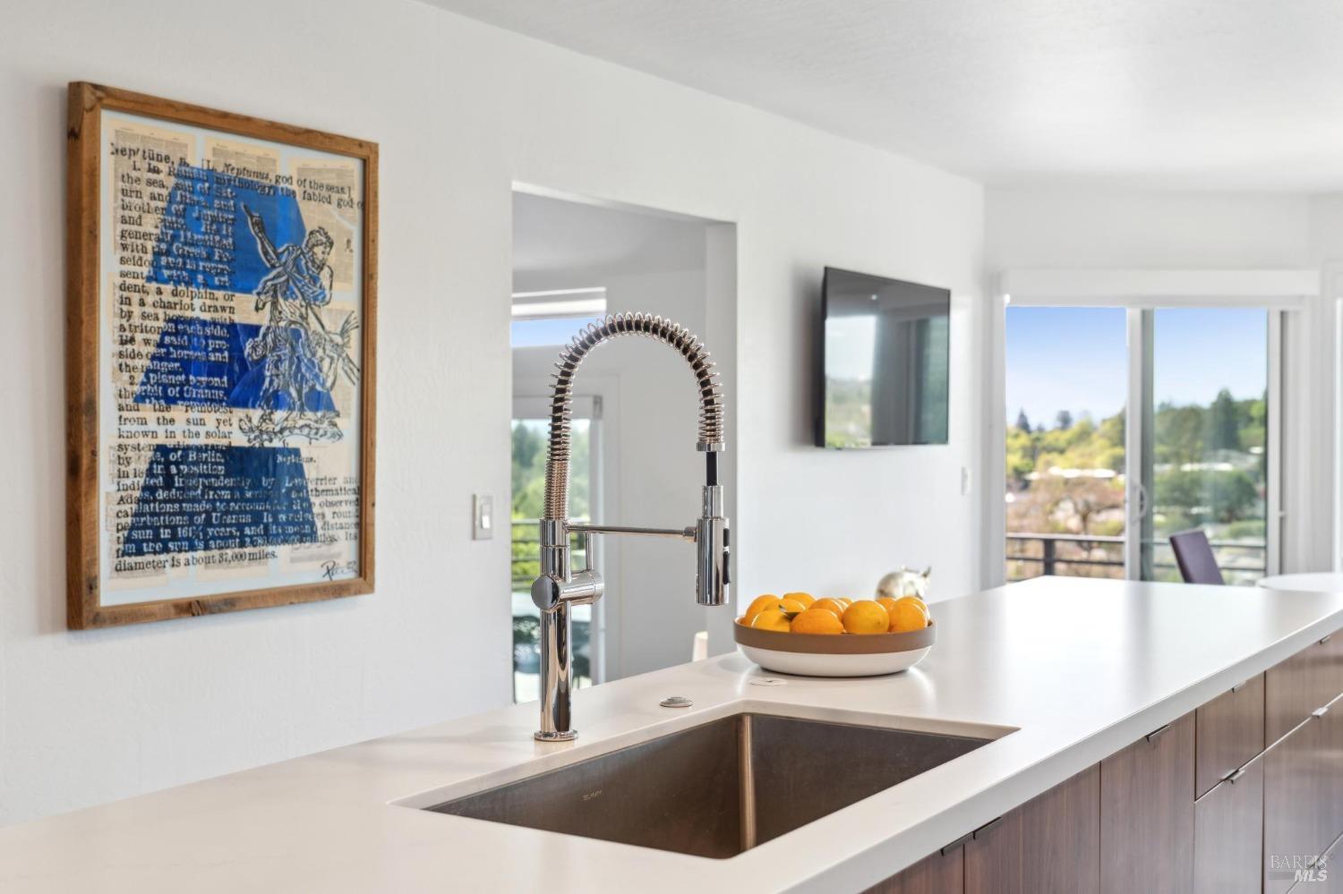 3485 Ridgeview Drive Santa Rosa, CA 95404 - Photo 14 of 63 a view of a kitchen with a sink and a refrigerator